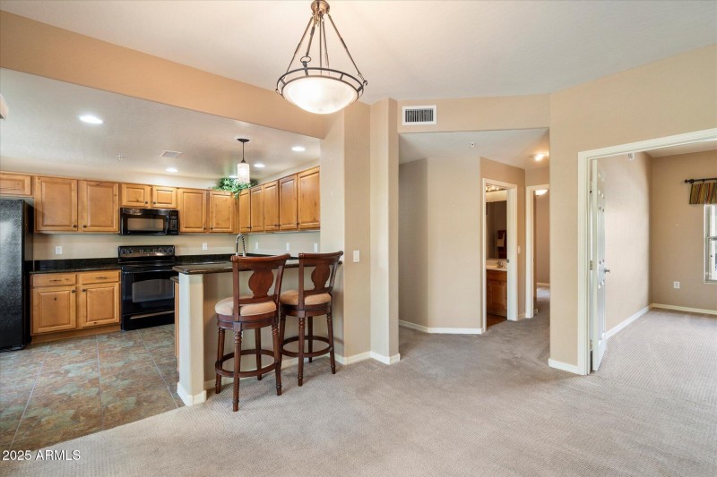 breakfast bar and entry to den