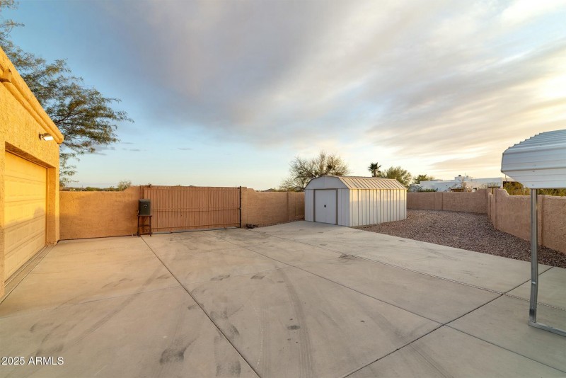 Behind electric gate for RV