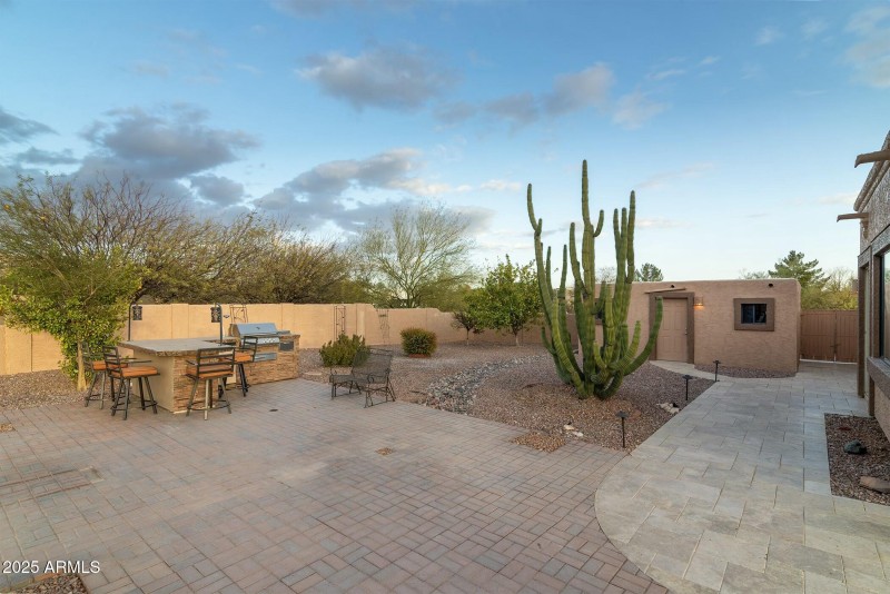 Back patio with hobby room