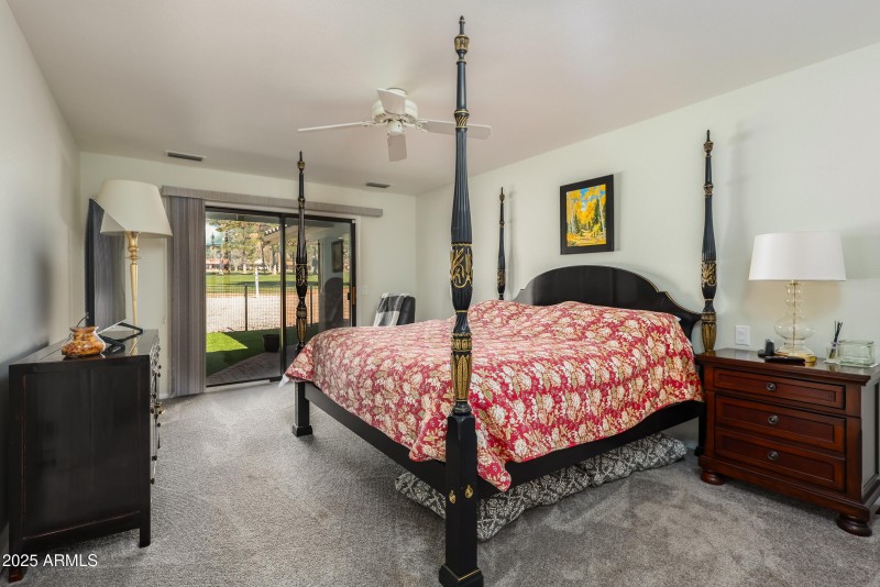 Primary Bedroom opens to back and views!