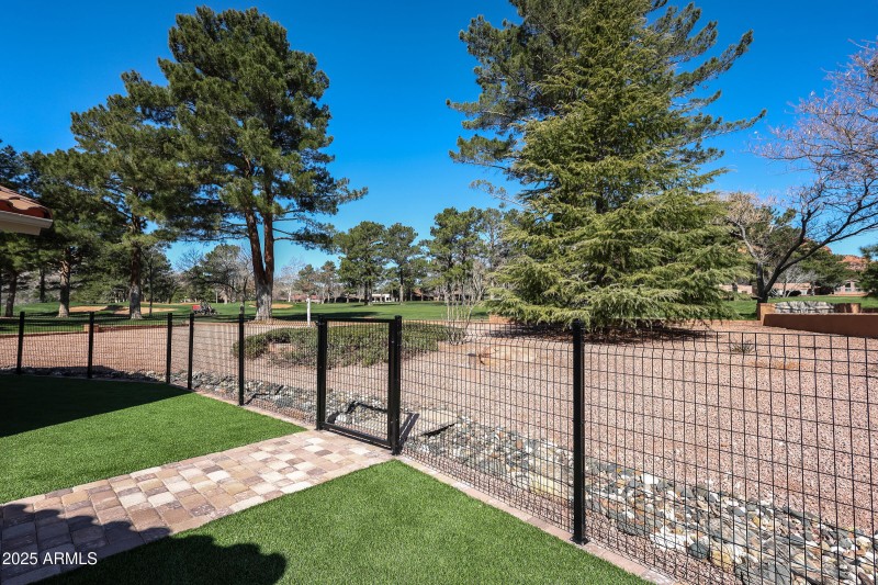 Turf and fencing for the pups