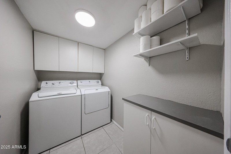 Inside Laundry Room With Washer & Dryer