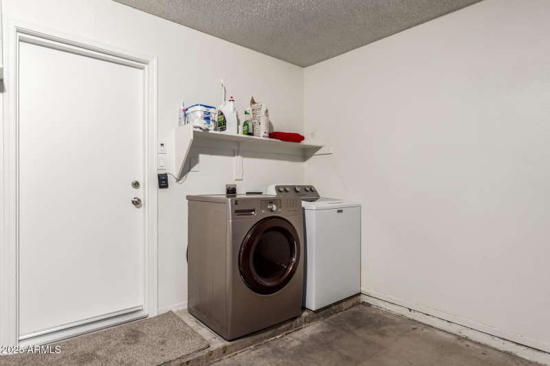 : Laundry Area With Storage Shelf