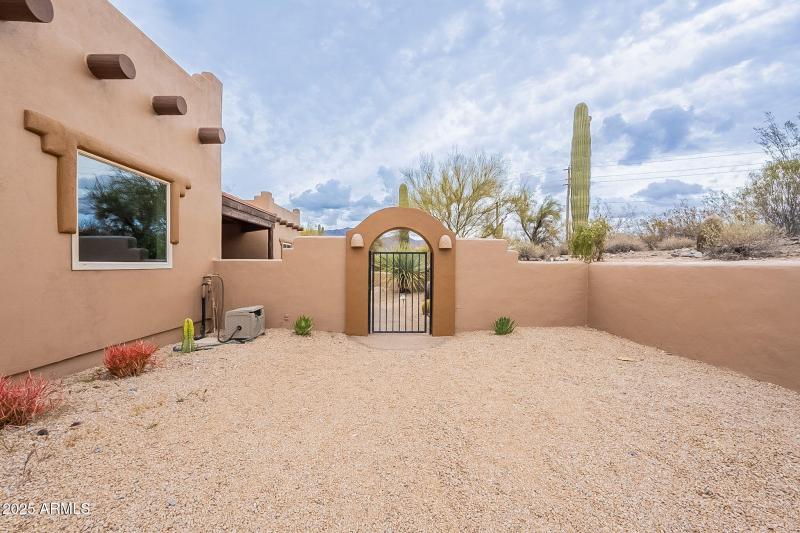 Additional parking leading to courtyard