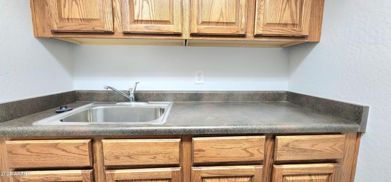 SINK IN LAUNDRY ROOM