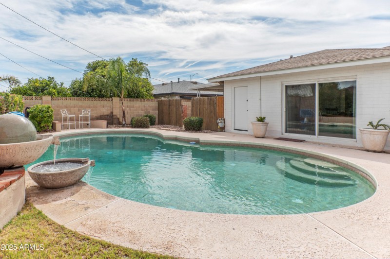 Heated Pool with Water Feature
