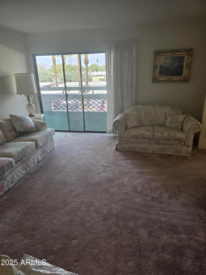 LIVING ROOM OUT TO BALCONY