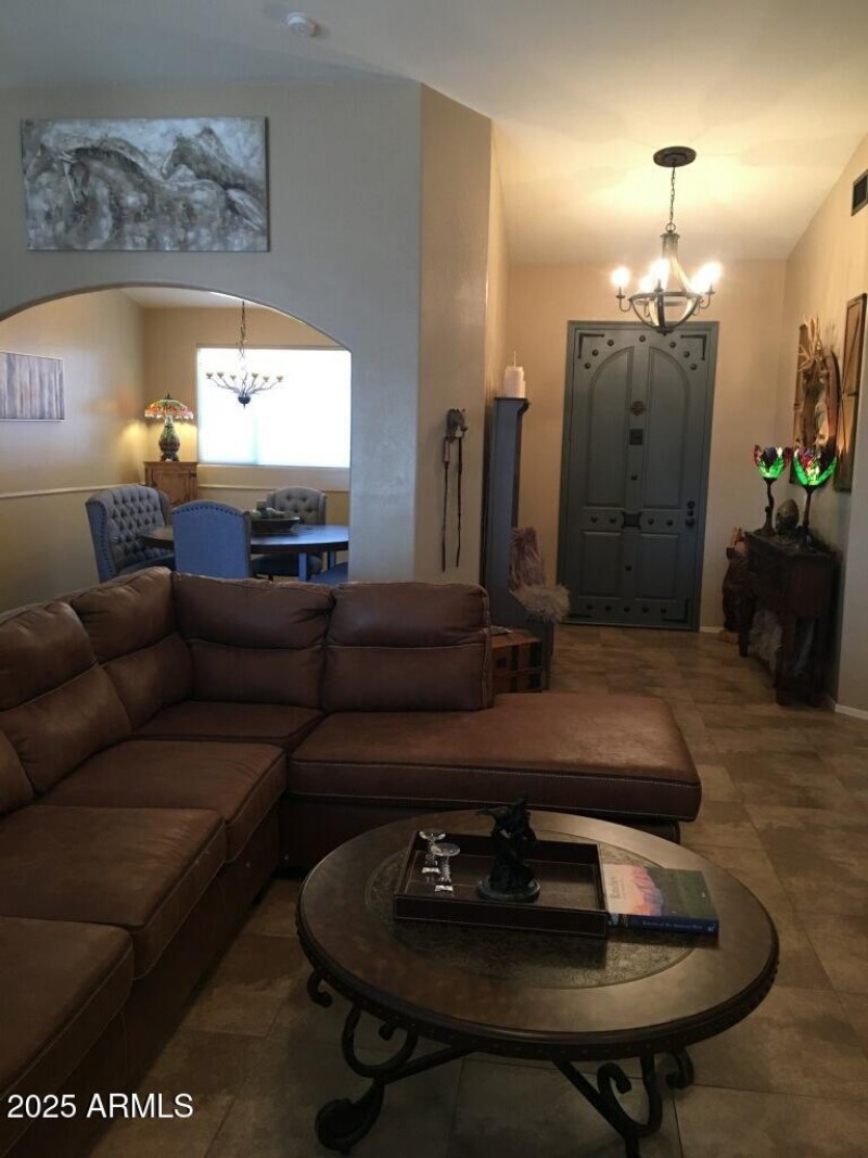 GREAT ROOM, FORMAL DINING AREA, & FOYER