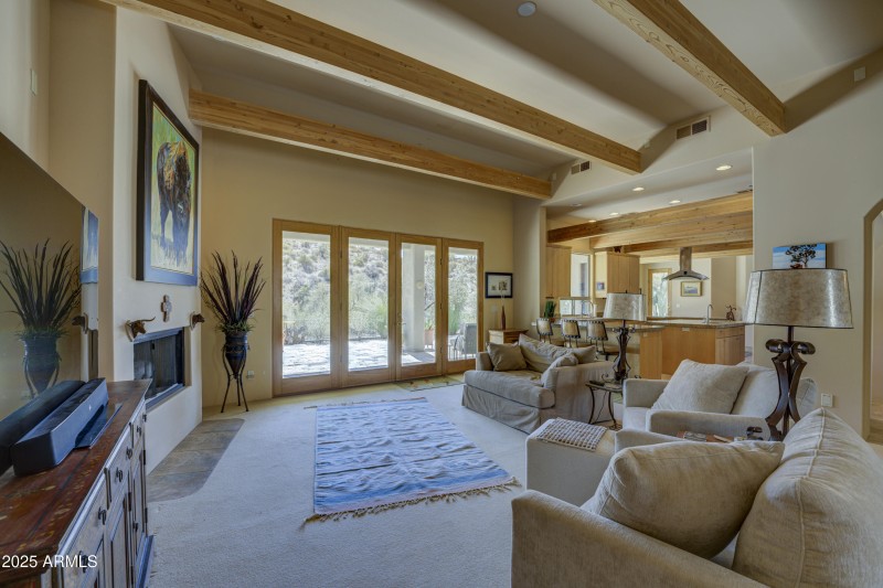 Great room opens to kitchen and patio