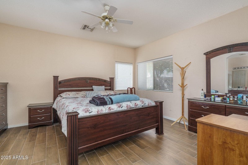 11) PRIMARY BEDROOM