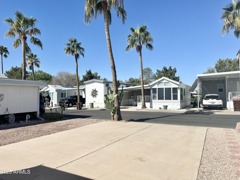 LOOKING FROM BACK OF LOT/STREET VIEW