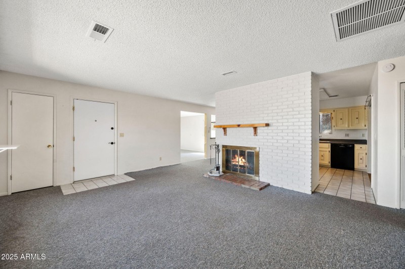 Den with fireplace