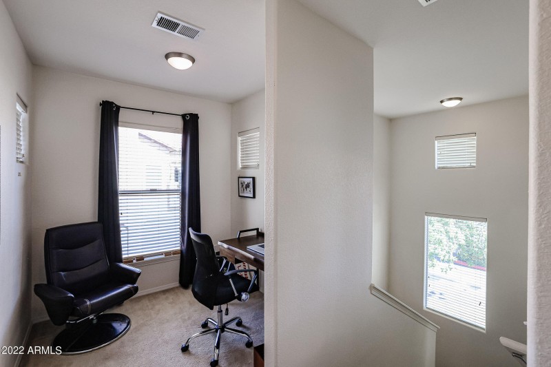 Cozy den located near the stairs