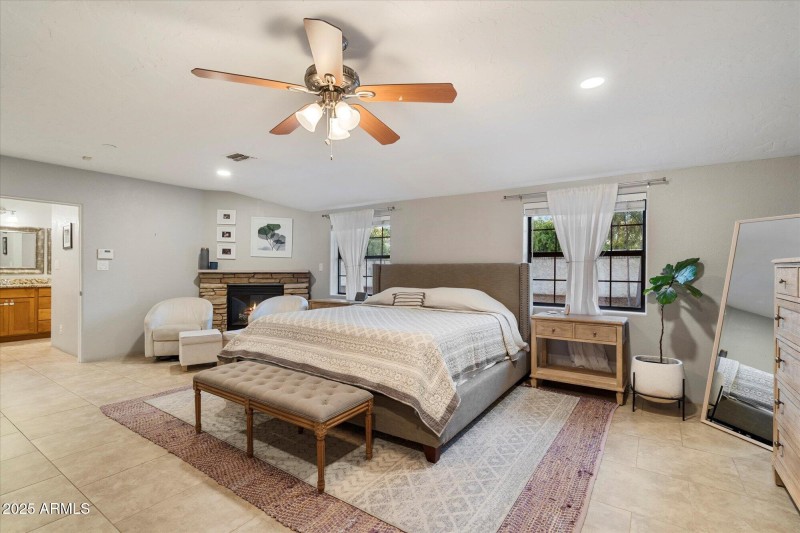 Primary Bedroom With Firepklace