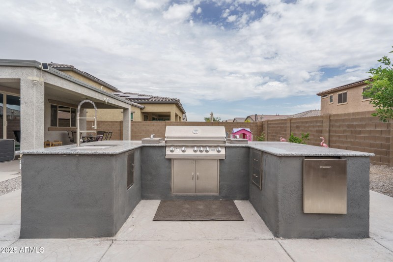 26) OUTDOOR KITCHEN