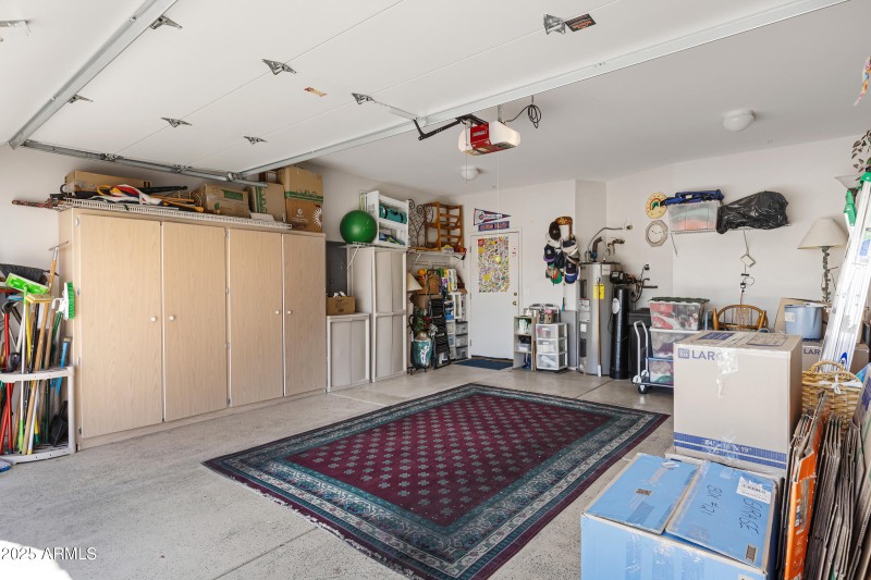 2 car garage w/storage cabinets