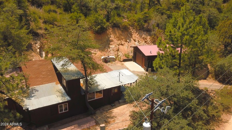 Hillside cabin with huge garage