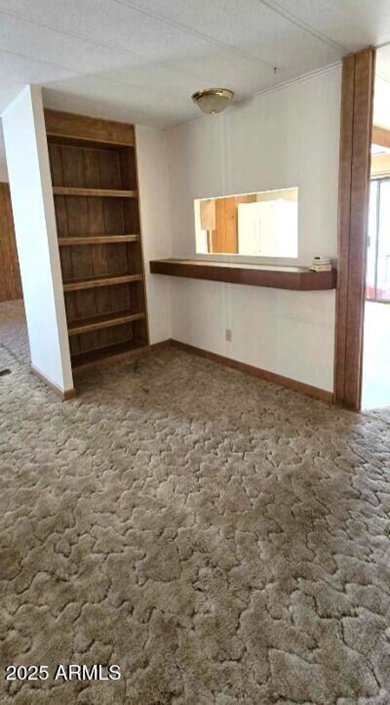 Linving room with built in book shelves