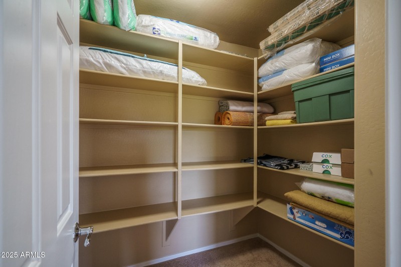 21C) UPSTAIRS HALL STORAGE