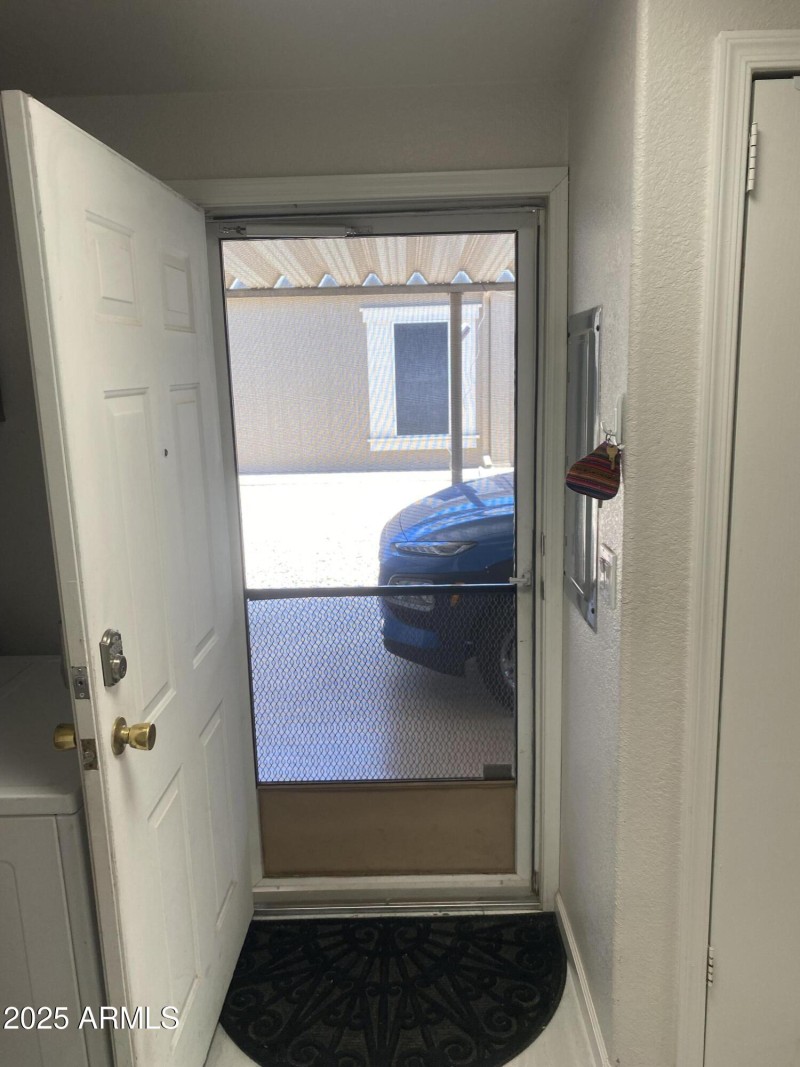 Carport door walking from washer and dry