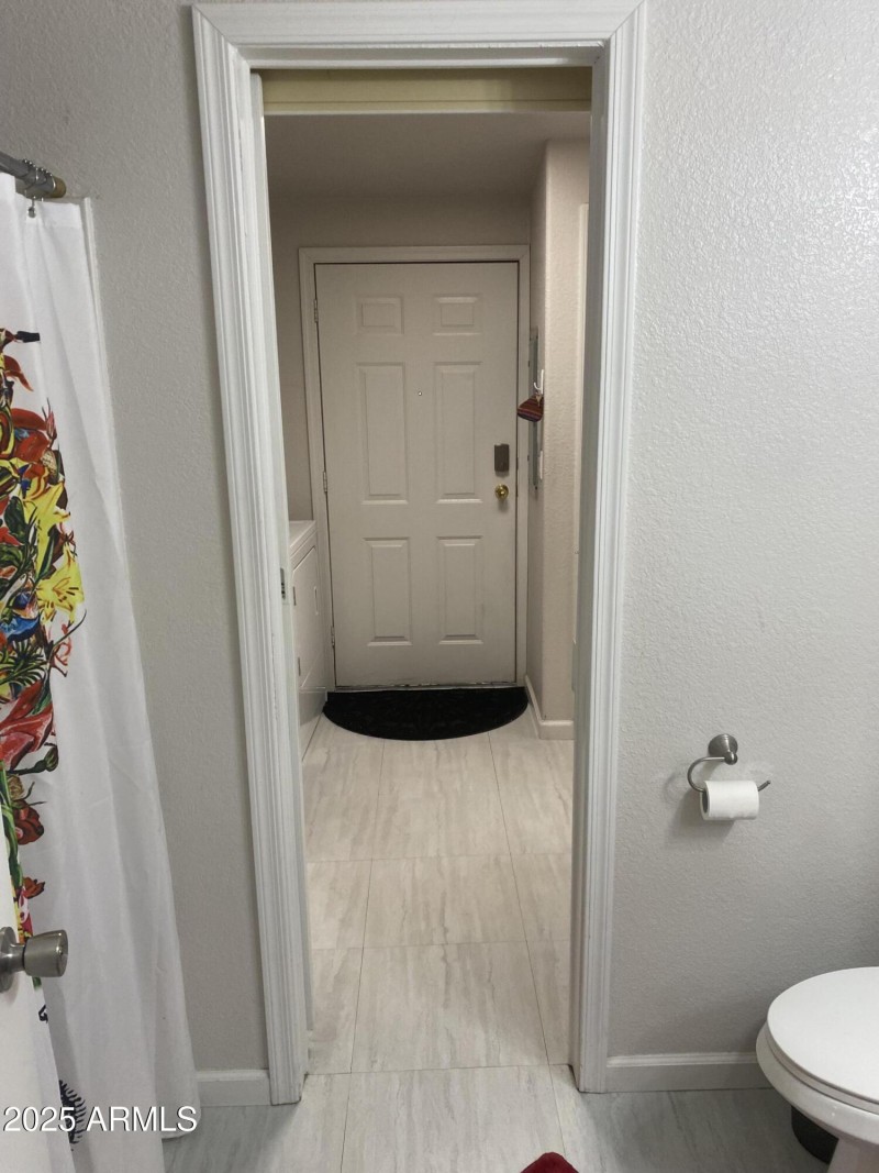 Hallway walking into bathroom #2 to wash