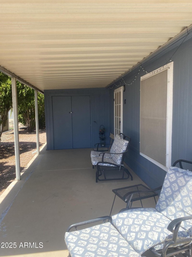 Lounging area with HUGE storage shed