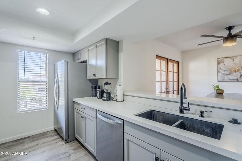 KITCHEN OVERLOOKS FAMILY ROOM