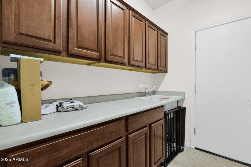 27 Laundry Room w: Utility Sink and Cabi