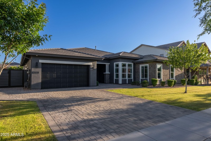 Front elevation with expanded driveway