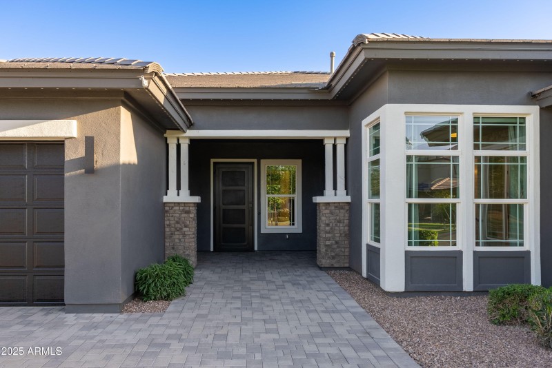 Paver front entry with custom door