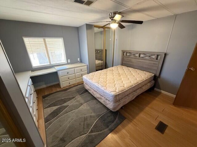 Master bedroom built in drawers and desk