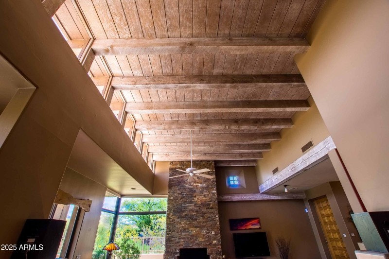 view of the rustic beamwork