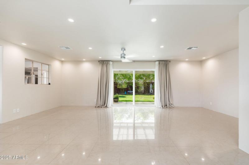 Expansive sliders to gorgeous backyard