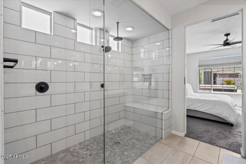 Full glass wall shower
