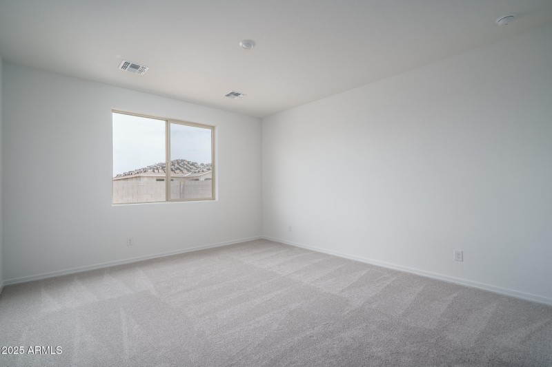 6) PRIMARY BEDROOM