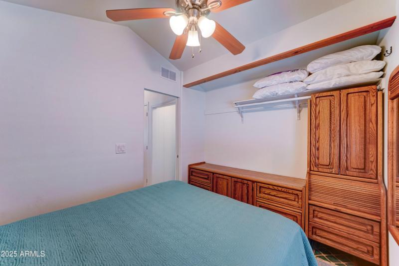 Armoire and dresser in bedroom