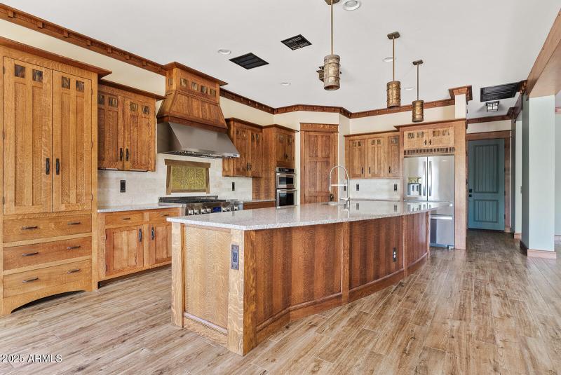 Gourmet Kitchen with Wood Accents