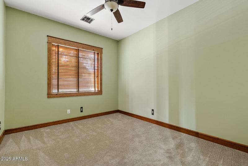 Spacious Bedroom with Ceiling Fan