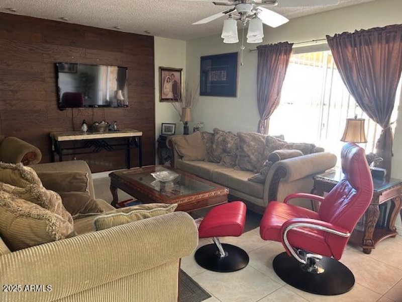 Living Room overlooks pool and yard