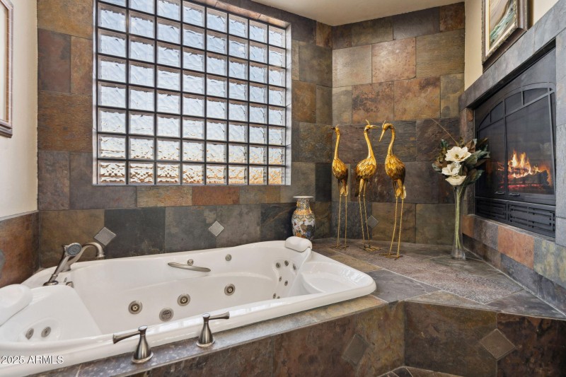 Primary Jetted Tub w/Fireplace