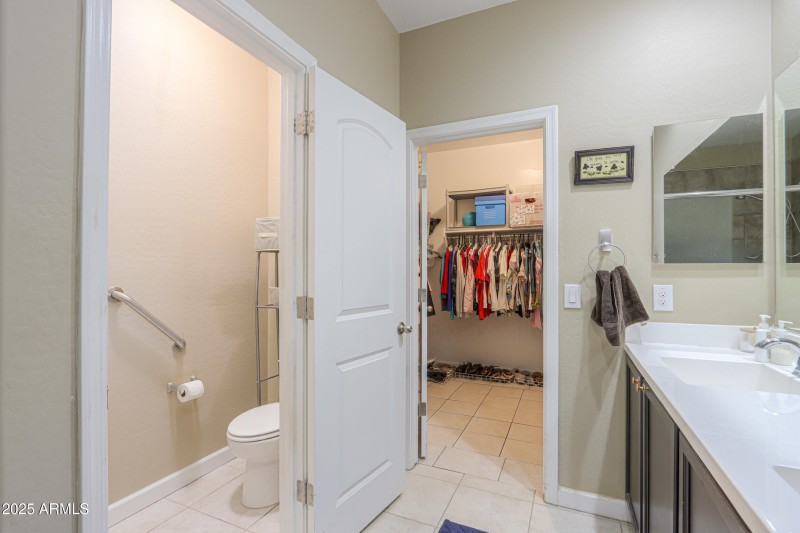 MASTER CLOSET WITH TILE FLOORING