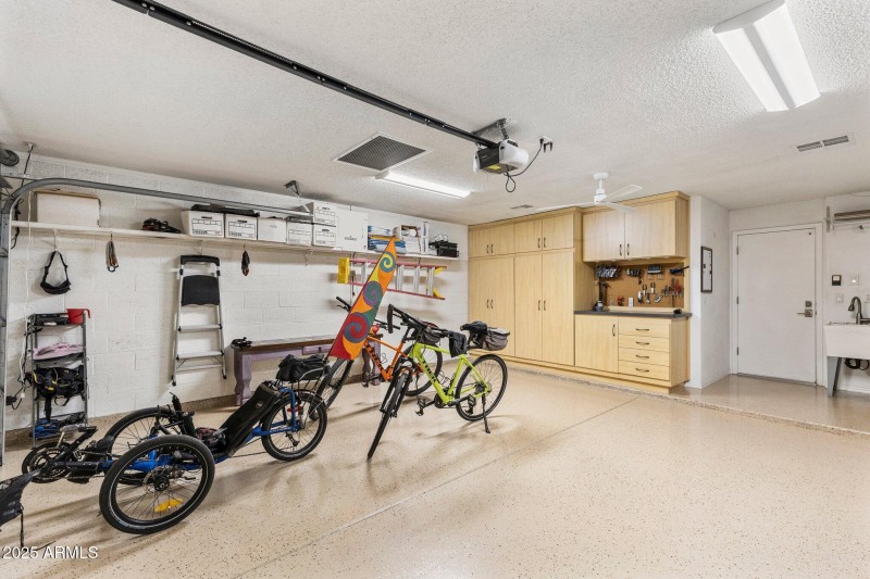 Epoxy Floors, Built-In Cabinets, Sink