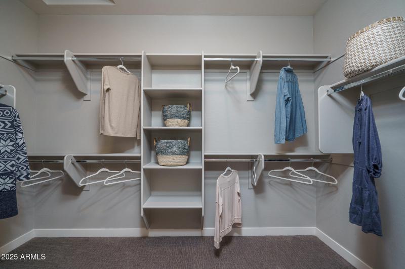 16) PRIMARY CLOSET