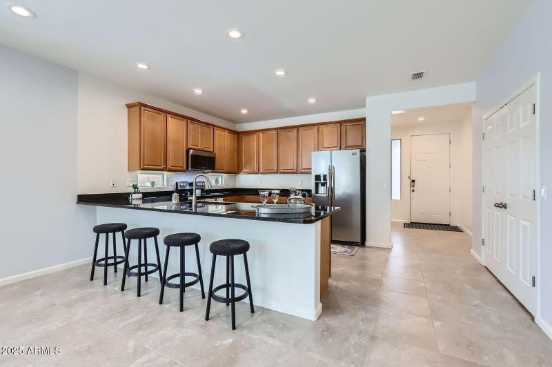 Kitchen with eat in bar