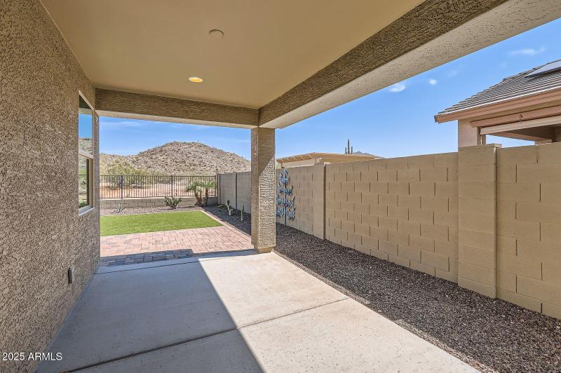 Covered patio with mountain views