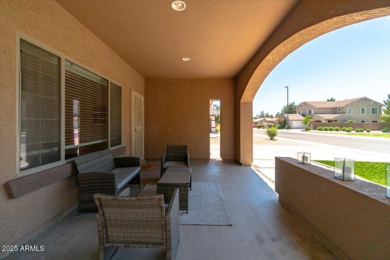 Porch overlooks park across the street