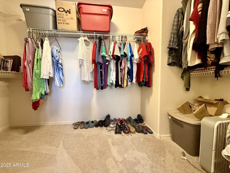 Upstairs Primary Suite Walk-In Closet