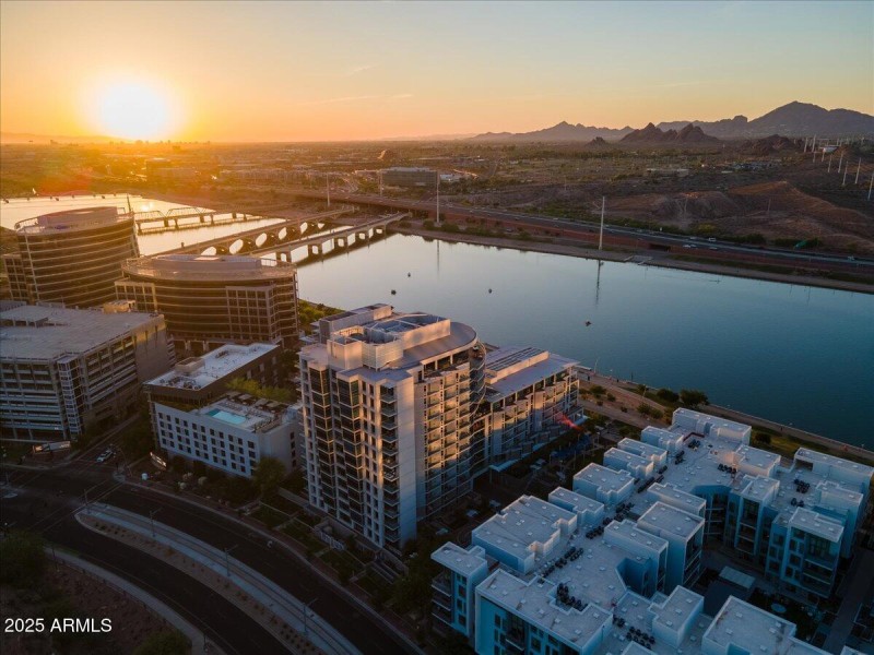 Drone looking at setting sun to north