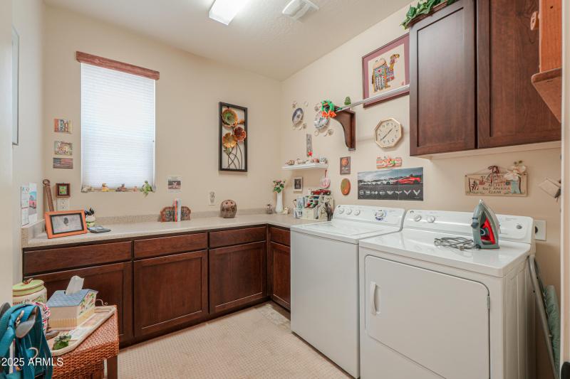 Laundry w/ cabinets