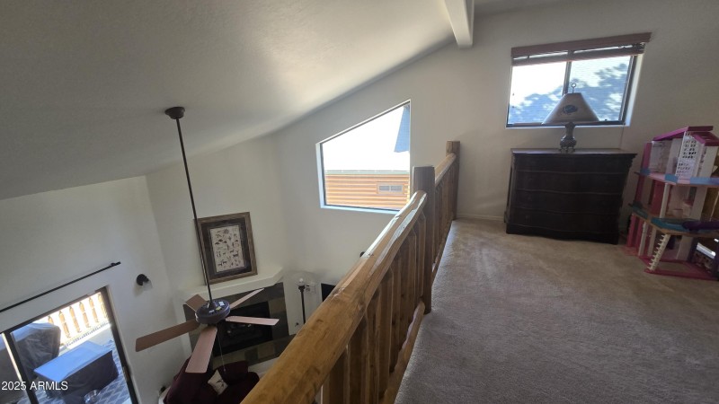 LOFT OPENS INTO GREAT ROOM